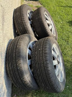 Prodám alu disky + pneu Renault Megane 185/60r15 - 3