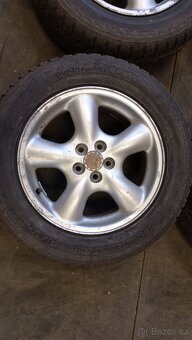 Subaru ALU Kola 6,5Jx16 ET48 Zimní 215/60/16 (Z199) - 3