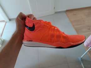 Dámské tenisky Nike Dual Fusion Tr Hit Mid
- 3