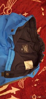 Zimní (lyžařske) kalhoty modré vel 140 - 3