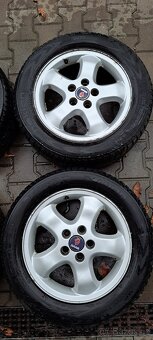 215/55/16 zimní sada Saab - 3