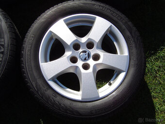 4XLETNÍ HLINÍKOVÁ KOLA ŠKODA FABIA II,III 185/60 R14 - 3