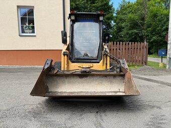 Kolový nakladač KOMATSU SK714 - 3