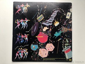 Queen. A Kind Of Magic. LP 1986. Capitol Records.Made in USA - 3