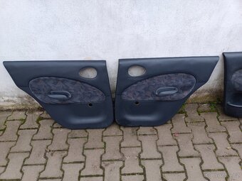 Tapecy Ford Escort 96- - 3