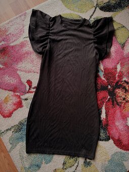 Balík dámského oblečení - 3