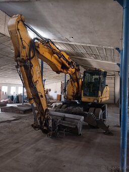 Kolový bagr Komatsu PW 180 - 3