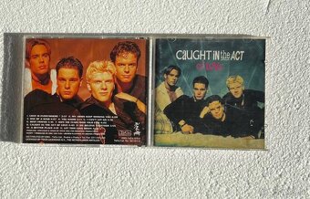 CD od Caucht In The Act - 3