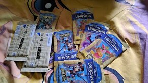 Lorcana booster packy a illumineer's trove - 3