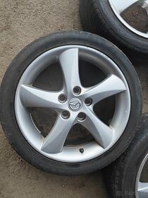 Prodám sadu Alu disků MAZDA 7Jx17H2 ET55 + pneu 215/45/17 - 3