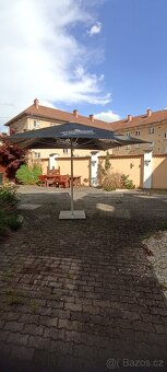 Slunečník Schweppes 3,4x3,4 m, výška 2,9m. se základnou - 3