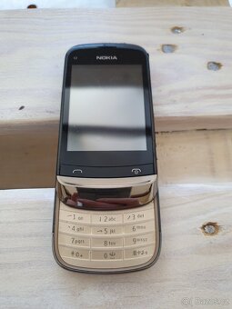 Nokia C2-03 s pouzdrem, nabíječkou. - 3