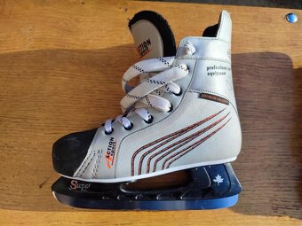 Prodám brusle vel. 40 - 3