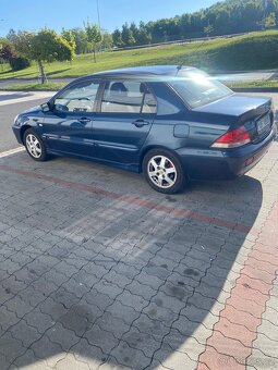 Mitsubishi lancer 1.6 2006r - 3