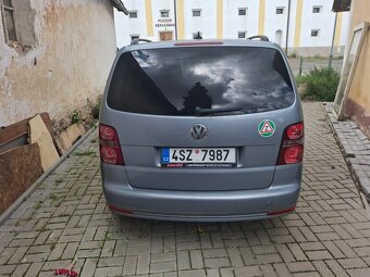 Touran 2.0 125kw - 3