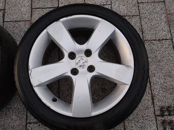 ALU kola Peugeot 17" vč. celoročních pneu a šroubů - 3