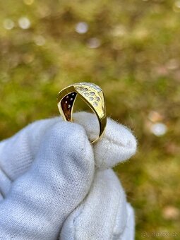 Zlatý prsten 3,69g
- 3