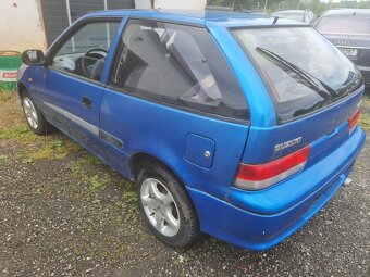 Suzuki Swift 1.0i, 39kW, 10/2001, klima - 3