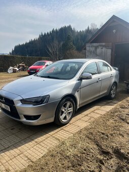 Mitshubishi lancer 1.8 105kw - 3