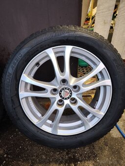 Prodám zimní kola Ford 205/55R16 - 3