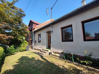RD se zahrádkou a 2x garáží v obci Přílepy. - 3