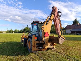Traktorbagr Case 580 super r - 3