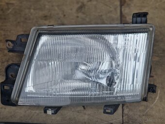 Subaru Forester SF - orig. přední světla - maska - 3