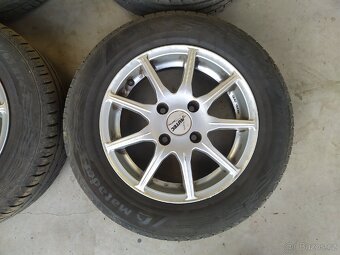 Prodám alu kola 185/65/14 rozteč 4x108 - 3