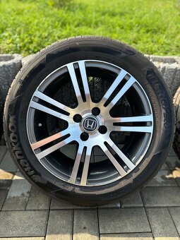 Prodám alu kola 4x100 r16 s letní pneu 205/55/16 - 3