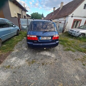 Kia carens - 3