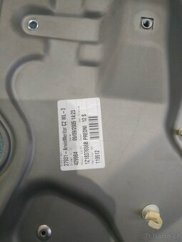 Octavia 2 pravá přední stahovačka - 3