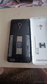 Asus T00Q - 3