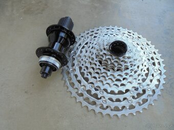Kazeta Sh. DEORE MicroSpline 12 speed. + Náboj Sh. - 3
