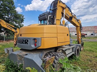 Kolové rypadlo LIEBHERR 312 kolový bagr LIEBHERR A312 - 3