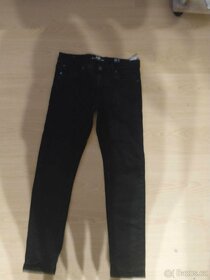 Černé dětské jeans a tričko Puma vel. 158 - 3