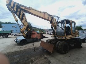 Bagr MH4, naklápěcí svahovka, 2 lžíce, hydr. kladivo - 3