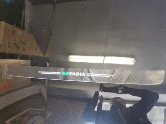 Zadní ochr.lišta škoda Fabia 2 - 3