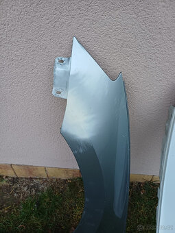 Pravý  Levý přední blatník Škoda Superb 3 III - 3