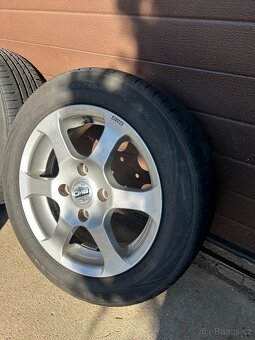 Alu kola+nexen Daewo Nubira 2004 -4x114,3 mm. 56,6 mm. - 3