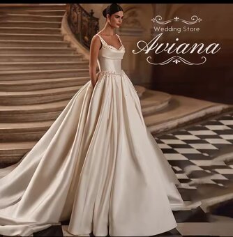 Krásné svatební šaty s perlami - 3