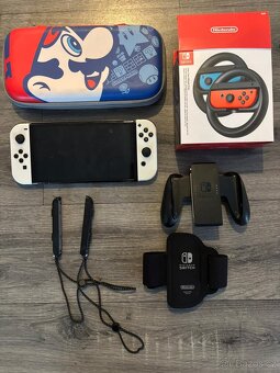 Nintendo switch (oled white) + příslušenství a 12 her - 3