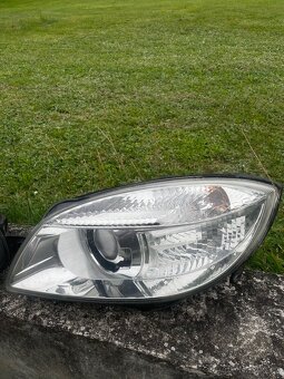 Přední světla Škoda Fabia II / Škoda Roomster Hella - 3