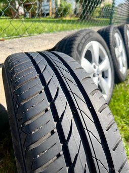 Sada ALU kol ŠKODA + zánovní letní pneu (Fabia, Rapid..) - 3