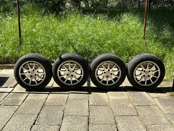 Prodám ALU kola rozteč 4x108 včetně letních pneu . - 3