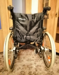 Invalidní vozik skládací mechanický repasovaný, brzdy. - 3