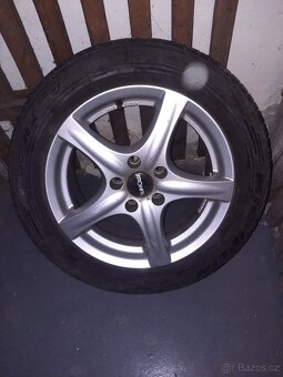 Prodám alu kola +pneu 215/55 R16 - 3