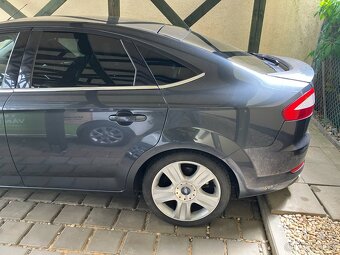 235/40 R18 UHP + Ford disky - 3