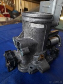 Škrtící klapka BMW e36 / e34 / z3 (M43) - 3