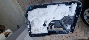 Tapecir předních levych dverí F150. F-150 2760505xr4 - 3