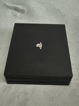 PlayStation 4 Pro 1TB + Assassin's Creed - 3